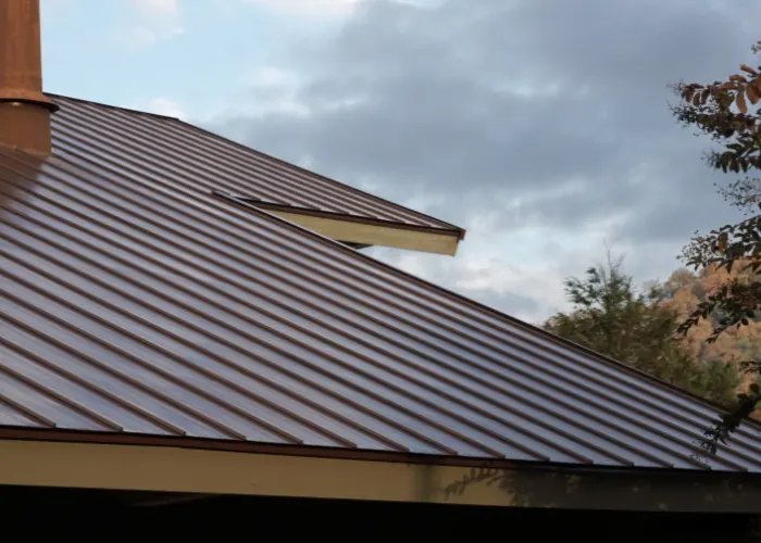 A brown metal roof that was repaired