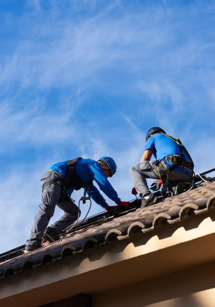 A Wesley Chapel roofing contractor preforming roofing maintenance